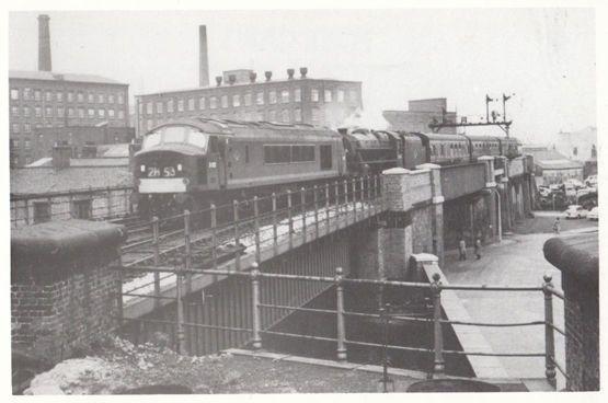 D122 & 44825 Derby Train entering Stockport Railway Station in 1962 Postcard