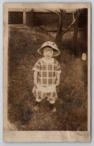 RPPC Simply Cute Child in Plaid Ready for a Day at the Beach Photo Postcard J23