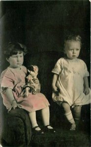 C-1910 Children doll toy hand tint RPPC Photo Postcard 21-3233