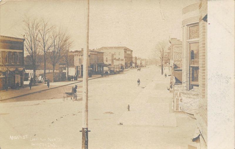 Rochester IN~Opera House Sign~Hardware~Junk on Side of Harness Shop~RPPC c1910 