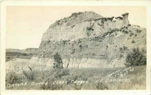 North Dakota Badlands Tortoise Butte Cedar Canyon 1932 RPPC Postcard 22-2060