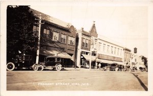 J67/ Kiel Wisconsin RPPC Postcard c1920 Fremont Street Stores Automobiles  359