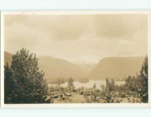 Pre-1949 rppc SMALL BUILDINGS BY LAKE AND MOUNTAINS Published In Canada W1031