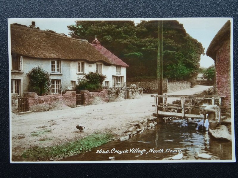 Devon CROYDE VILLAGE shows Foot Bridge & Women Filing Pail  - Old RP Postcard