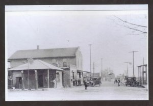 REAL PHOTO DONALDSON INDIANA GAS STATION STREET SCENE PSOTCARD COPY