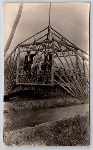 RPPC Unique Rustic Log Bridge Three Men on Rail over Stream Canal Postcard B30