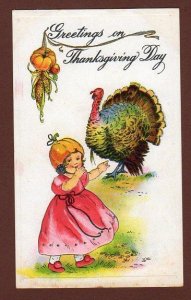 1910's GREETINGS ON THANKSGIVING DAY TURKEY GIRL W/PUMPKIN HAT POSTCARD