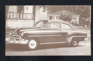 1952 CHEVROLET SLEETLINE DELUXE 2DR SEDAN CAR DEALER ADVERTISING POSTCARD