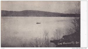 Row boat in the middle of Lac Connelly, Quebec, Canada, PU-1953