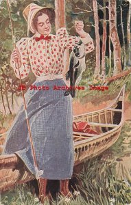 Fishing, Woman Standing Next to Row Boat with a Fish She Caught