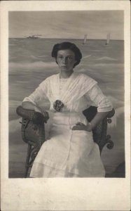 Woman in White Studio Portrait Ocean Backdrop c1910 Real Photo Postcard