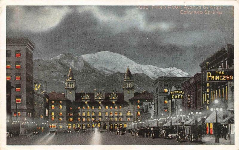 CO, Colorado Springs  PIKES PEAK AVENUE~Night View TUCKERS CAFE c1920's Postcard