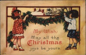 Christmas Children Decorating Bergman c1910s Postcard