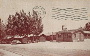 WEST CODY WYOMING~1940s COVERED WAGON MOTEL-HWY 14 & 20~1956 POSTMARK POSTCARD