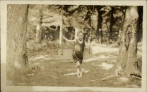 Little Boy on Wooden Tree Swing c1915 Real Photo Postcard