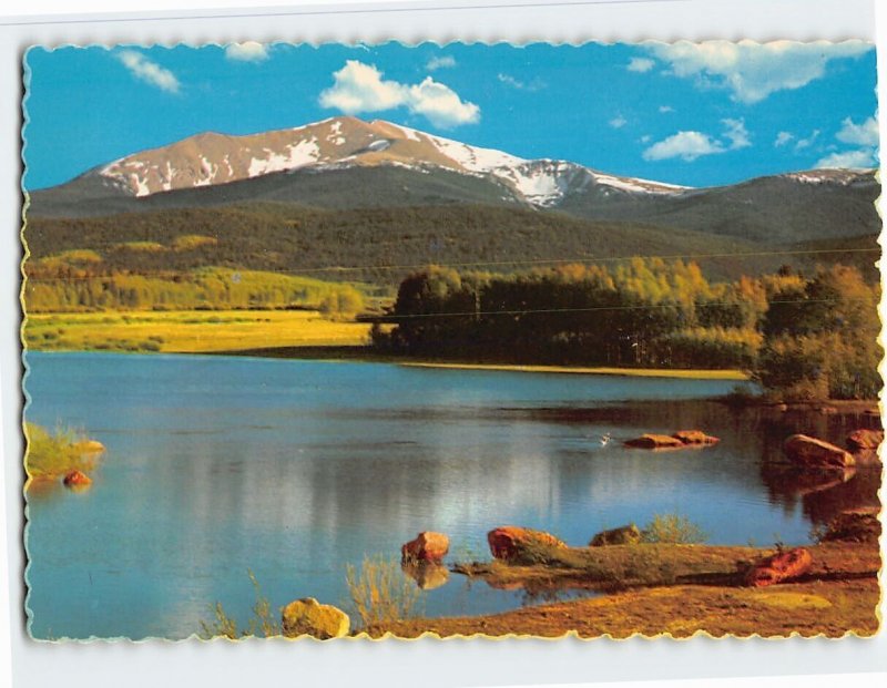 Postcard Snow thatched peak reflected in a placid lake, Colorado