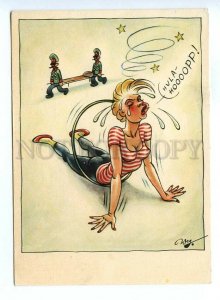 498838 East Germany GDR gymnastics with Hula Hoop humor rescue brigade by Weg