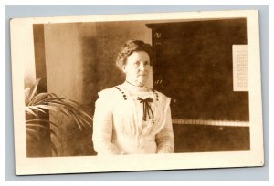 Vintage 1910's RPPC Postcard - Woman in White Dress Sitting at the Piano