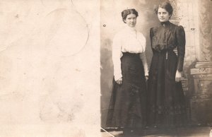 VINTAGE POSTCARD TWO STANDING WOMAN RPPC c. 1910 REAR COVERED BY ADD-ON [as is]