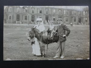 Social History CHILD ON A DONKEY with Mother & Father c1906 RP Postcard