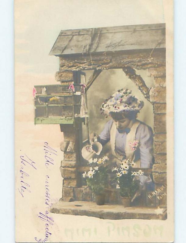 Pre-1907 rppc ANTIQUE BIRD CAGE HANGS BESIDE WOMAN WATERING DAISY FLOWERS HM1300