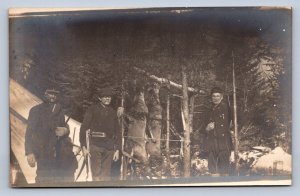 J87/ Interesting RPPC Postcard c10 Men Camp Rifles Deer Hunting Guns Hunt 465