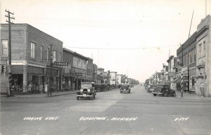 H24/ Gladstone Michigan RPPC Postcard c1940s East Drug Store Autos  15