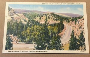 VINTAGE PENNY LINEN POSTCARD UNUSED U.S.HWY #10 OVER CONTINENTAL DIVIDE, MONTANA