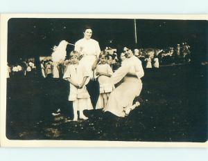 Pre-1918 rppc GIRLS WITH FLUFFY TOYS ON STICKS Bowling Green Ohio OH v5198