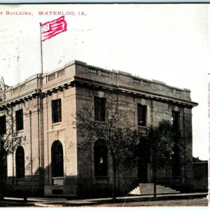 1907 Waterloo, IA Government Building Hand Colored Flag Litho Photo Postcard A36