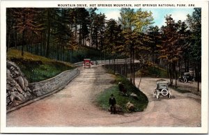 Postcard AR Hot Springs Mountain Drive man sitting on rock antique cars