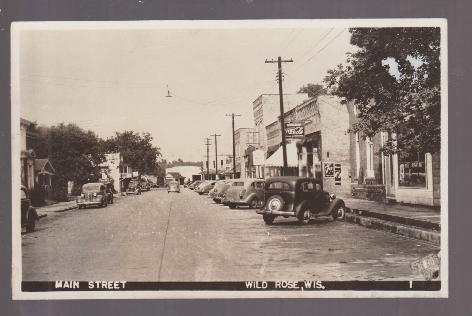 Wild Rose WISCONSIN RPPC 1945 MAIN STREET STORES nr Waupaca Wautoma