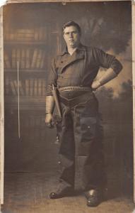 F8/ Toledo Ohio RPPC Postcard c1910 Studio Costume Gun Holster Mean