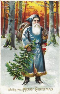 Santa Claus in Blue Suit Carrying Sack of Toys and Christmas Tree