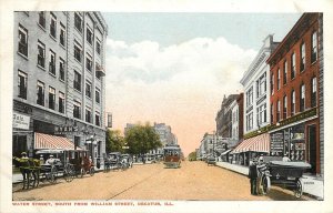 c1920 Postcard, Decatur IL Water Street at William St., Macon Co. Business Signs