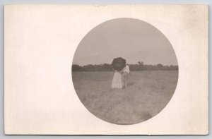 RPPC Romance A Stroll in Field Under the Umbrella Photo from Behind Postcard B30