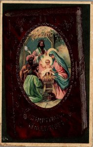 c1910 CHRISTMAS GREETING NATIVITY SCENE ON BIBLE EMBOSSED POSTCARD 25-34