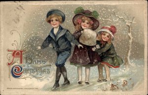 Christmas Children Walking Snow Storm Embossed Winsch c1912 Postcard