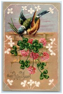 c110's New Year Bird Shamrock Flowers Embossed Posted Antique Postcard