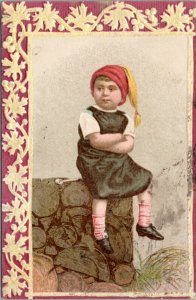 Trade Card - Woolson Spice - Boy in night gown and cap sitting on logs with pipe