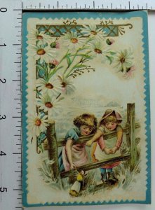 1870's-80's Embossed Trade Card Two Girls Playing With A Doll Daisies *K