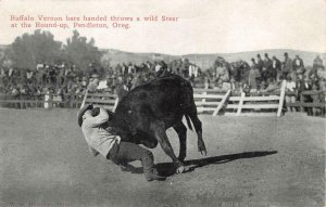 Cowboy Buffalo Vernon throws Wild Steer Pendleton Round-Up Rodeo c1910s Postcard