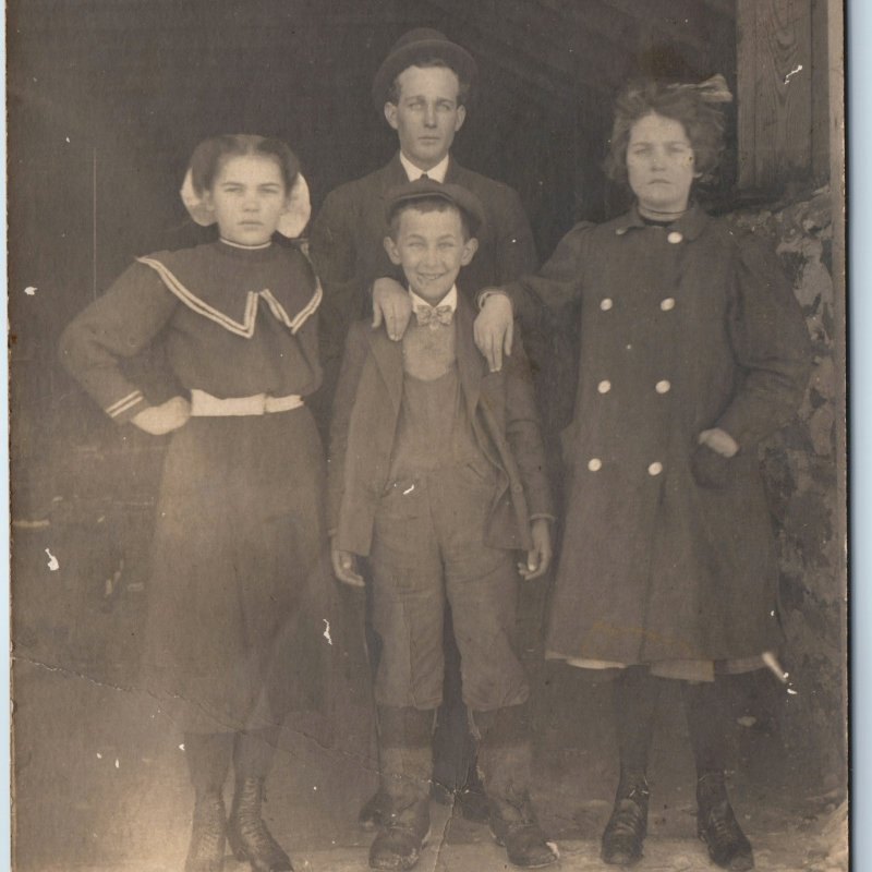 c1910s Family Group Barn RPPC Boy Smiles Newsboy Cap Cute Women Girls Photo A212