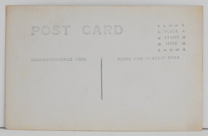 Two cute babies in a wicker chair - Postcards