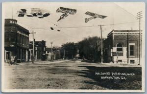 PHOTOMONTAGE AIRPLANES ZEPPELIN OVER HOPKINTON IA ANTIQUE REAL PHOTO PC RPPC