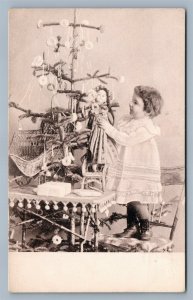 CHRISTMAS TREE DECORATING ANTIQUE POSTCARD NEW YEAR