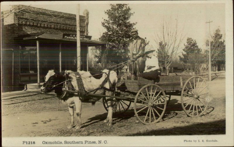 Southern Pines NC Oxmobile Oxen Cart Black Man & Storefront c1910 RPPC