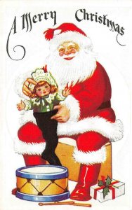 Holiday  A MERRY CHRISTMAS Smiling SANTA With DOLL & DRUM  c1910's Postcard