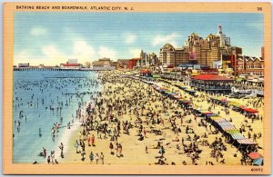 VINTAGE POSTCARD CROWDED BATHING BEACH AND BOARDWALK ATLANTIC CITY c. 1940