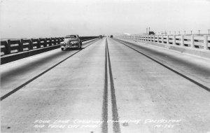 Postcard RPPC Texas Galveston Four lane causeway autos M-365 1940s 23-7845